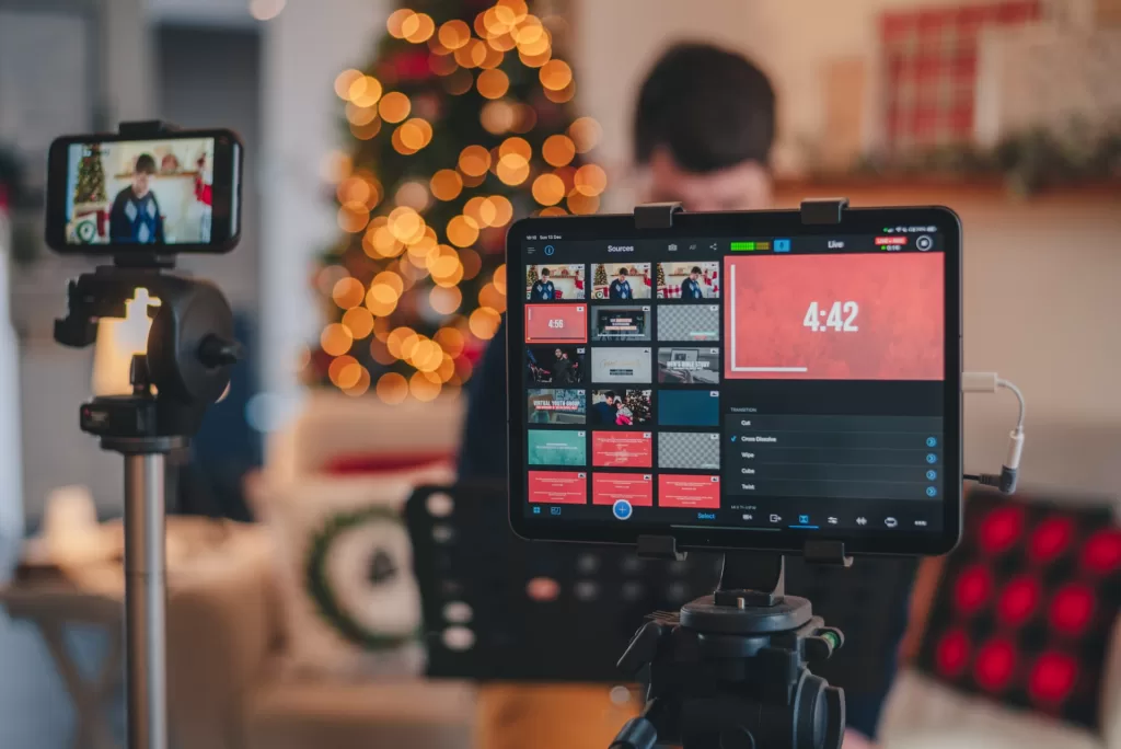 An influencer filming for social media