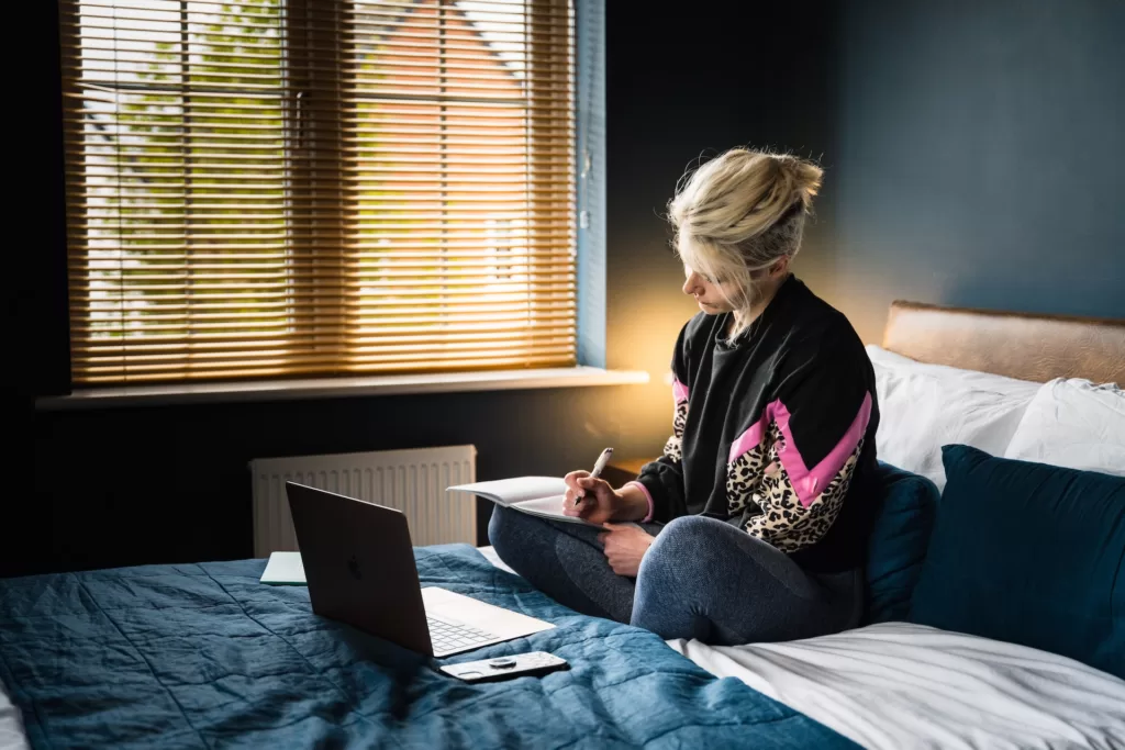 a woman prepares business plan