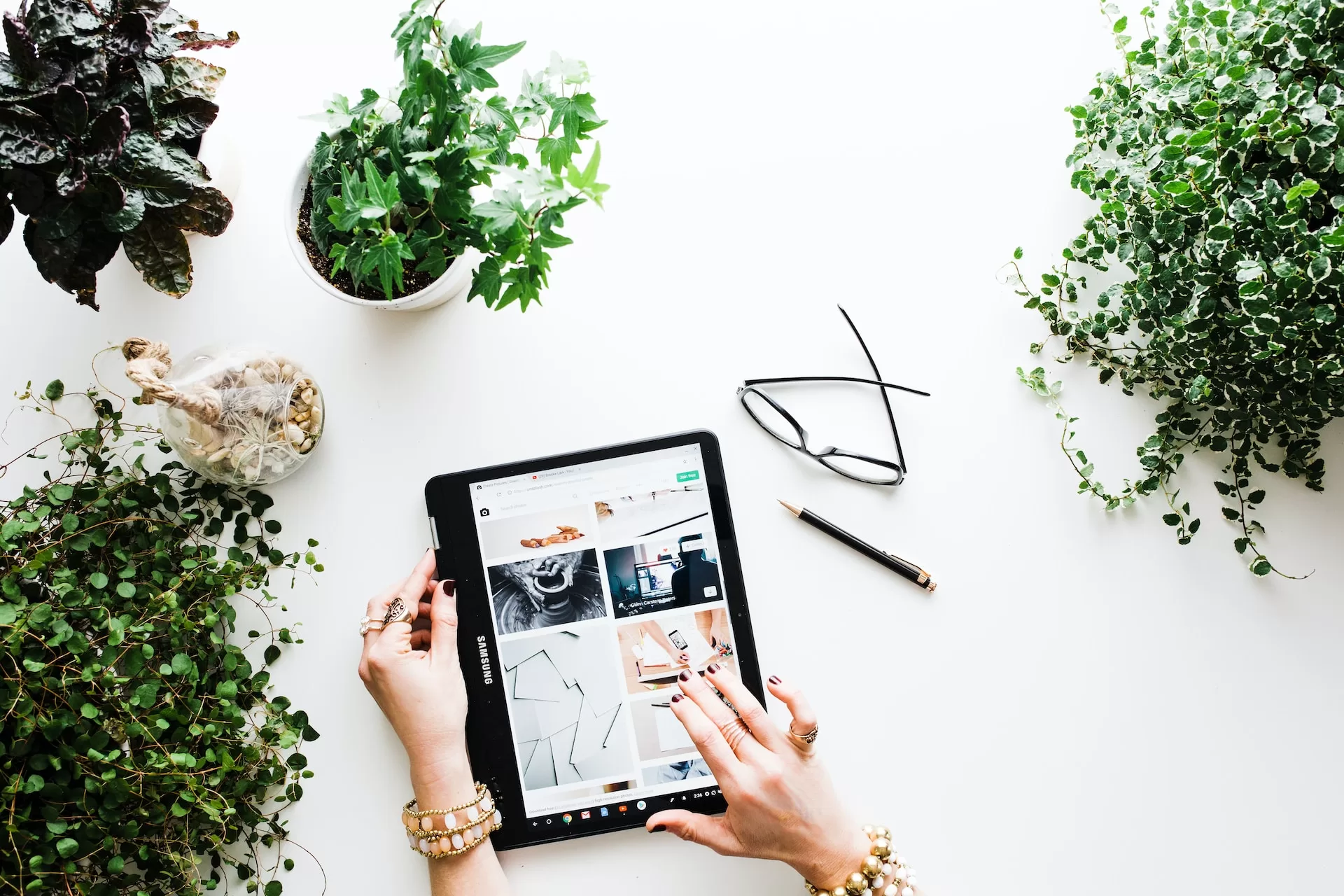 Person browsing content resources for thei business on the tablet